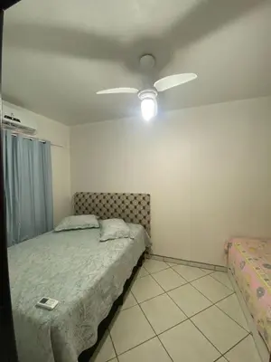 Uma cama ou camas num quarto em Sobrado 300m praia de Bombas