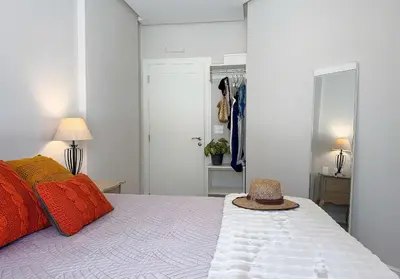 Uma cama ou camas num quarto em Alto Padrão, 3 Suítes A/C, 3 Vagas, Pé na Areia