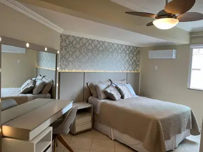 Uma cama ou camas num quarto em Ap Canto da Praia - Itapema