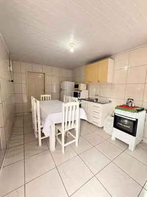 A cozinha ou kitchenette de Casa a 100m Praia de Zimbros, Bombinhas