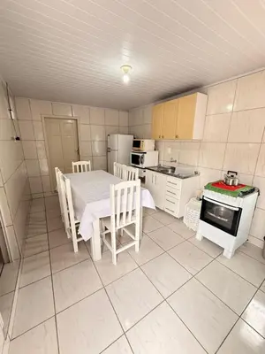 A cozinha ou kitchenette de Casa a 100m Praia de Zimbros, Bombinhas