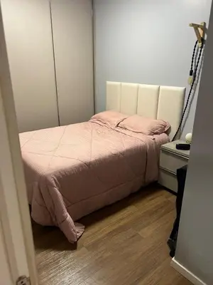 Uma cama ou camas num quarto em Apartamento Alto Padrão