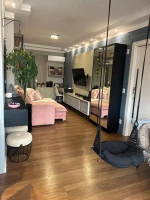 Uma televisão e/ou sistema de entretenimento em Apartamento Alto Padrão