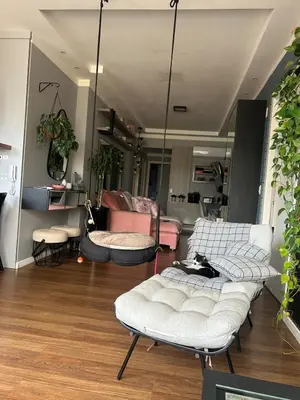 Uma área de estar em Apartamento Alto Padrão