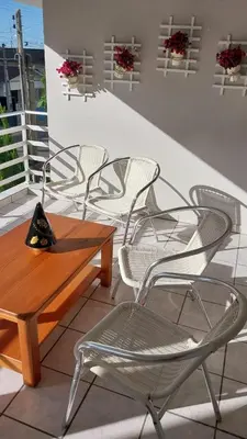 Uma área de estar em Casa Espaçosa Meia Praia