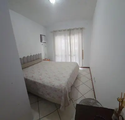 Uma cama ou camas num quarto em Apto 3 quartos em Meia Praia prox ao shopping Russi