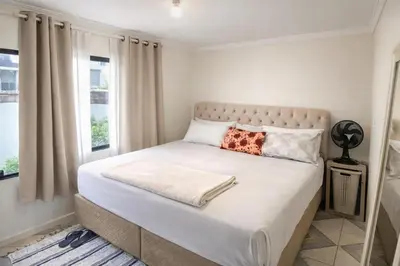 Uma cama ou camas num quarto em Reveillon em bc casa completa ideal para familia
