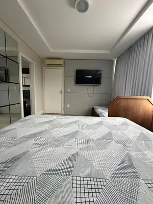 Uma cama ou camas num quarto em Casa com piscina e 04 suítes e linda vista para toda a cidade