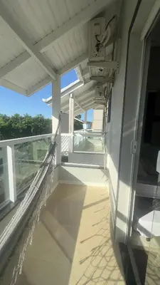 Uma varanda ou terraço em Pousada Cantinho da Kel suítes para 2,3 e 4 pessoas , 600 metros da praia de Bombinhas