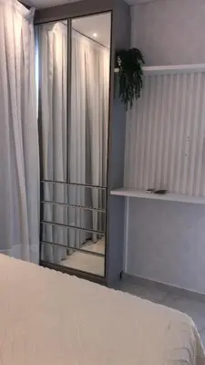Uma cama ou camas num quarto em Suíte privada