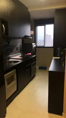 A cozinha ou kitchenette de Suíte privada