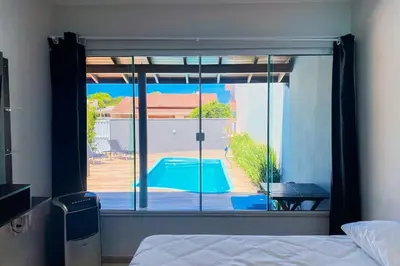 A piscina em ou perto de Casa com piscina privativa para locação - 0316
