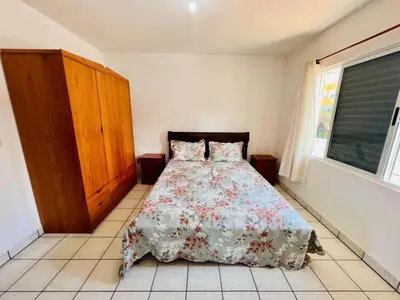 Uma cama ou camas num quarto em Residencial Mar de Mariscal