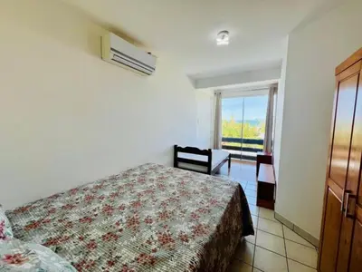 Uma cama ou camas num quarto em Residencial Mar de Mariscal