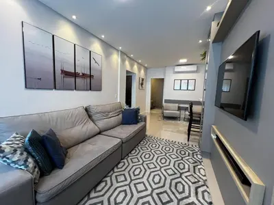 Uma televisão e/ou sistema de entretenimento em Apartamento em Mariscal 2 Quartos e Perto da Praia