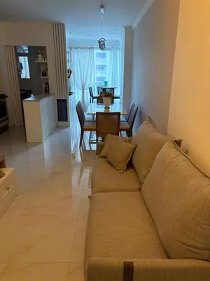 Uma área de estar em Apartamento Morretes