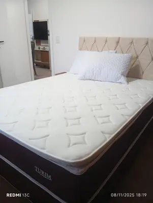 Uma cama ou camas num quarto em Residencial Trentin