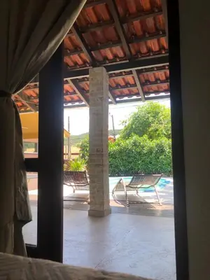 Uma varanda ou terraço em Linda casa com piscina em Bombinhas, espaço inteiro