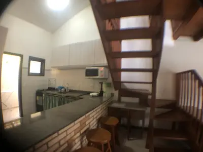 A cozinha ou kitchenette de Linda casa com piscina em Bombinhas, espaço inteiro