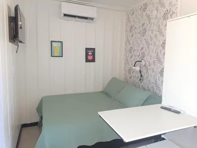 Uma área de estar em Studio Borboletas de luz