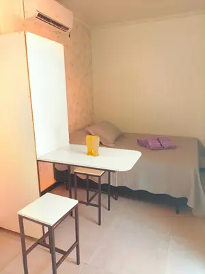 Uma cama ou camas num quarto em Studio Borboletas de luz