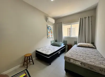 Uma cama ou camas num quarto em Belíssimo Apto Duplex na Praia de Palmas a Poucos Minutos do mar - Para 6 pessoas