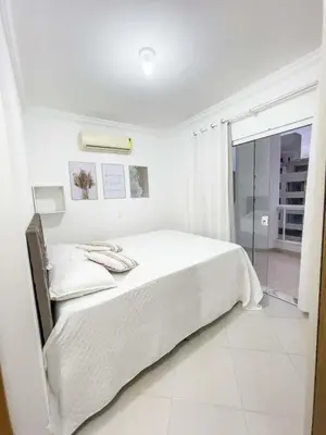 Uma cama ou camas num quarto em Cobertura Bombas