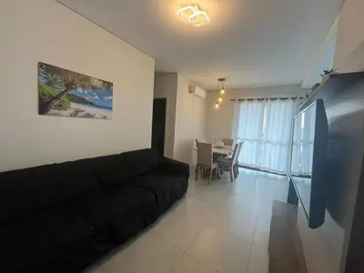 Uma televisão e/ou sistema de entretenimento em Queridinho da praia de palmas