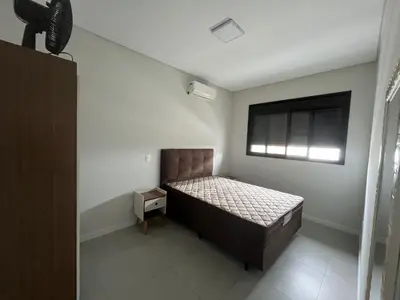 Uma cama ou camas num quarto em Queridinho da praia de palmas