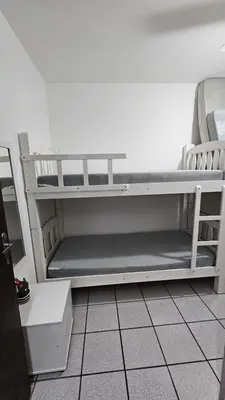 Uma cama ou camas num quarto em Apartamento no Residencial Umuarama A
