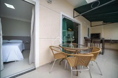 Uma cama ou camas num quarto em Cobertura 3 dormitórios em Bombinhas