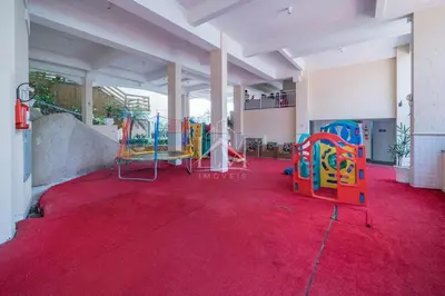 A área de jogos para crianças em Cobertura 3 dormitórios em Bombinhas