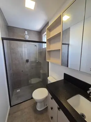 Uma casa de banho em Apartamento Itapema Caravan