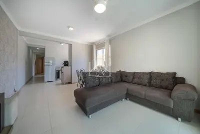 Uma área de estar em Apartamento 02 Residencial Antares