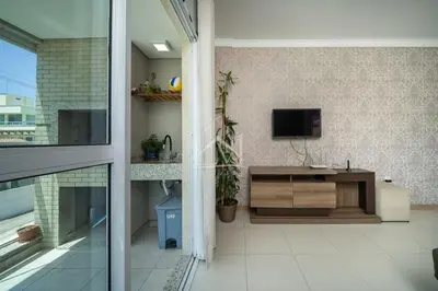 Uma televisão e/ou sistema de entretenimento em Apartamento 02 Residencial Antares
