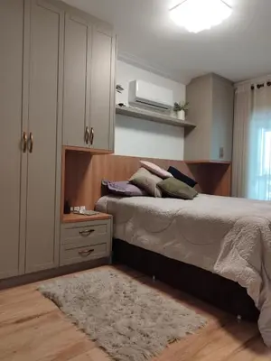 Uma cama ou camas num quarto em APARTMENTO em BOMBINHAS Vista Mar