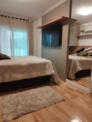 Uma cama ou camas num quarto em APARTMENTO em BOMBINHAS Vista Mar