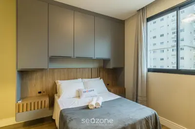 Uma cama ou camas num quarto em Apto c/ Churrasqueira a 900 m da Praia EPD0702