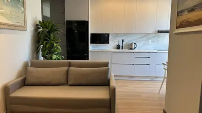 A cozinha ou kitchenette de Itapema flat a 300m da praia e píer