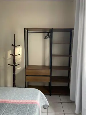 Uma cama ou camas num quarto em Casa de praia Mariscal
