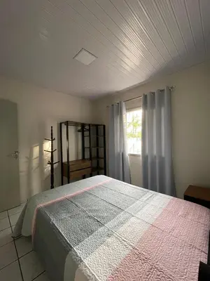 Uma cama ou camas num quarto em Casa de praia Mariscal
