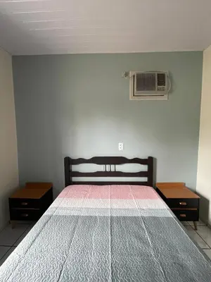 Uma cama ou camas num quarto em Casa de praia Mariscal