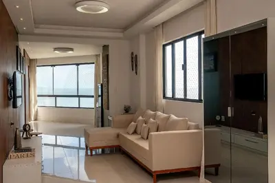 Uma televisão e/ou sistema de entretenimento em GHBC01 - Apt Beira Mar - 3 Suítes - 3 vgs de gargem