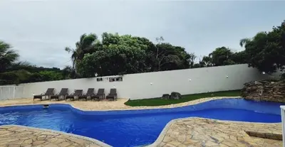 A piscina em ou perto de Apartamento com piscina em quatro ilhas