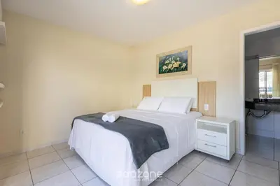 Uma cama ou camas num quarto em Apto no Centro de Itapema, a 200m do Mar EBM0122
