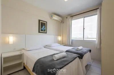 Uma cama ou camas num quarto em Apto no Centro de Itapema, a 200m do Mar EBM0122