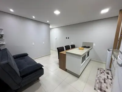 Uma área de estar em Jollie Loft em Calheiros Governador Celso Ramos