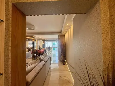 Uma área de estar em Lindo apartamento a 50 Metros da praia de Balneário Camboriú, com vista mar