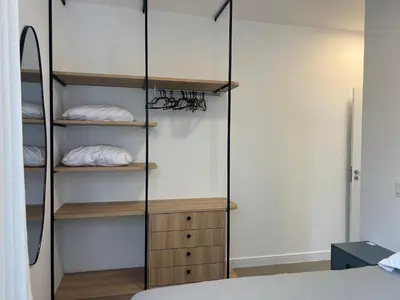 Uma cama ou camas num quarto em Lindo! Apartamento na Praia de Palmas - DE03J
