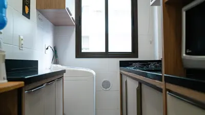 A cozinha ou kitchenette de Apartamento TOP Garden com SPA a 550 m da Praia